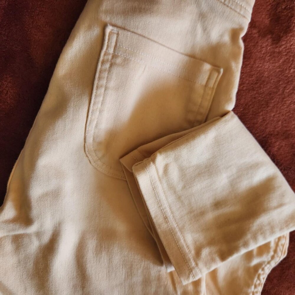 Original American Apparel High Waisted Skinny Jeans in Orange Cream. Size Small.